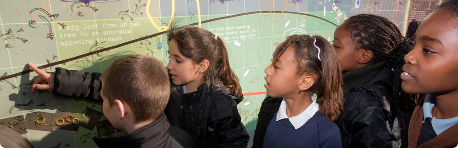 School Children interacting with a diagram on an exhibition board